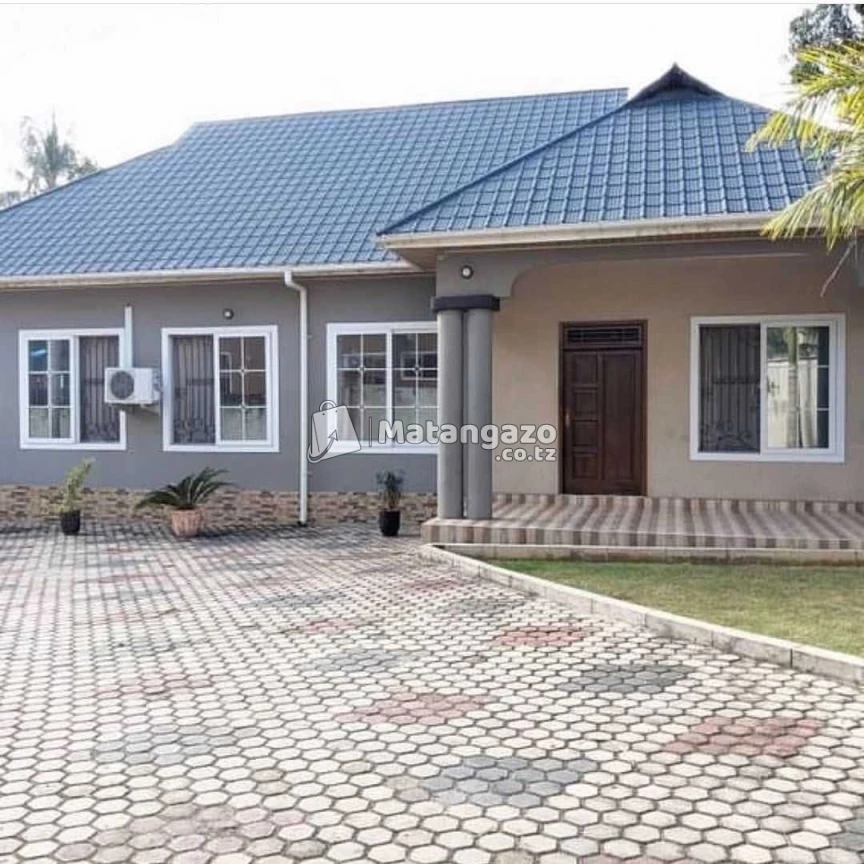 NYUMBA YENYE VYUMBA VITATU INAPANGISHWA LAKI 8 KWA MWEZI IPO CHANGANYIKENI