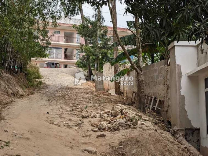 KIWANJA KINAUZWA MILIONI 90 MAONGEZI YAPO SQMT 1500 LINA HATI LIPO BUNJU
